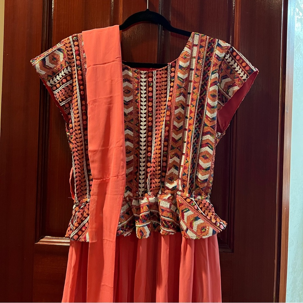 Peach/Coral Geometric Print Peplum Dress